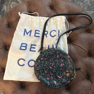 Clare V. round floral purse